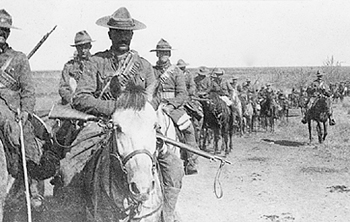 Boer War Picture, The 2nd Regiment, Canadian Mounted Rifles on patrol in South Africa, February - March 1902. Note the rather bedraggled appearance of some of the Stetsons, the Orndorff bandoliers, and Mark 1 Lee-Enfield rifles. NAC PA173029