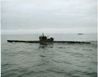 Le U-190 et son escorte canadienne