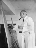 German artist Ludwig Hirschfeld Mack painting in his studio; taken in Melbourne, Victoria, c. 1950; donated by the artist's family to the collection of the Australian War Memorial; P004558.001