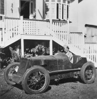 Informal portrait of artist Grace Taylor, wearing a Land Army uniform, seated in a 'Jitterbug' motor car; taken in Brisbane, c 1944; donated by the artist's family to the collection of the Australian War Memorial, P04575.002