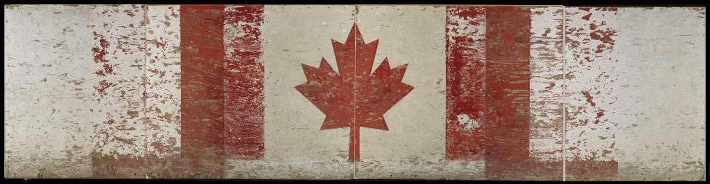 Panneau de bois éraflé, décoré d’un drapeau canadien